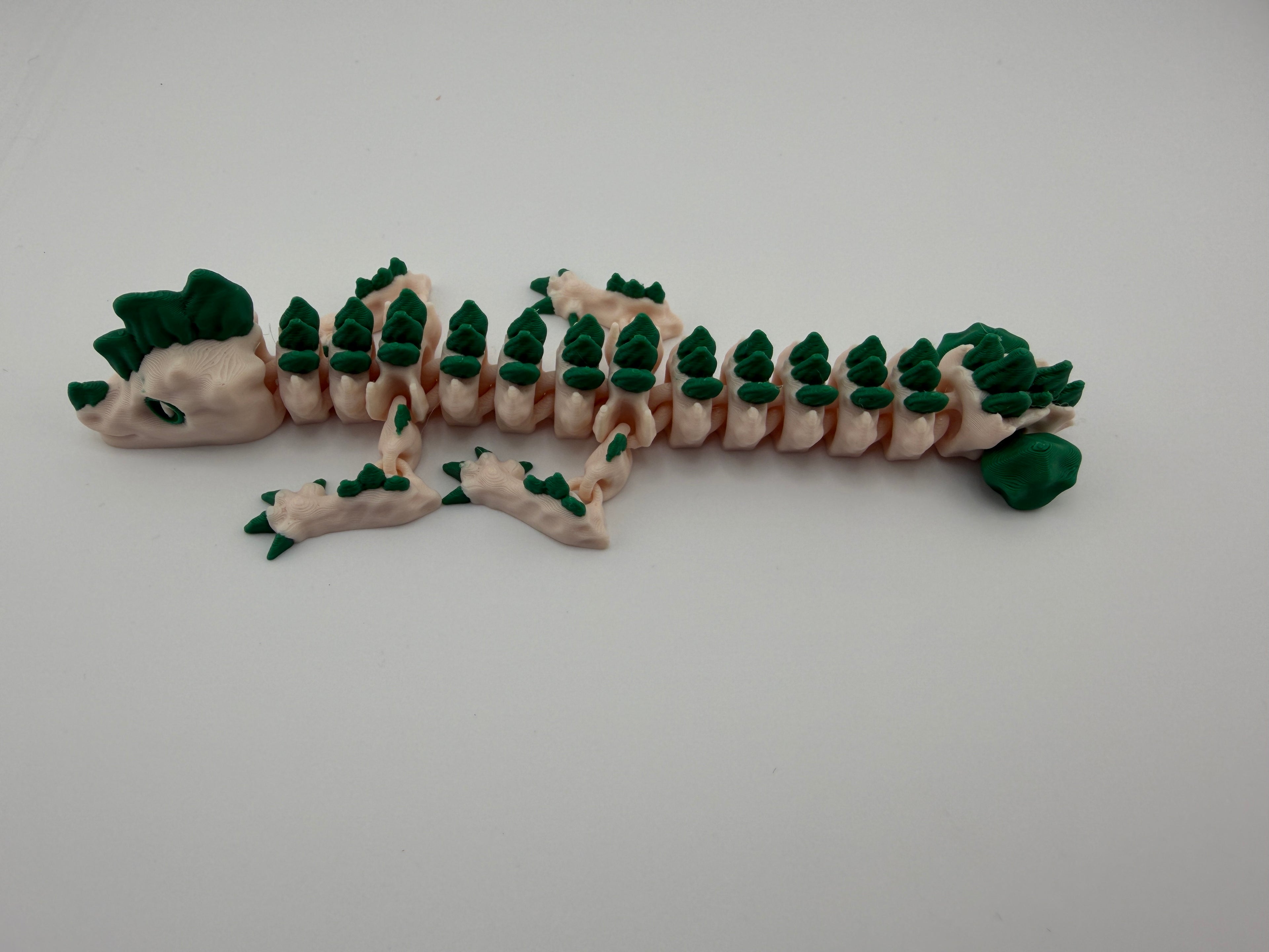 Dino Dragon – 8” Dragon with Spinning Bone Tail