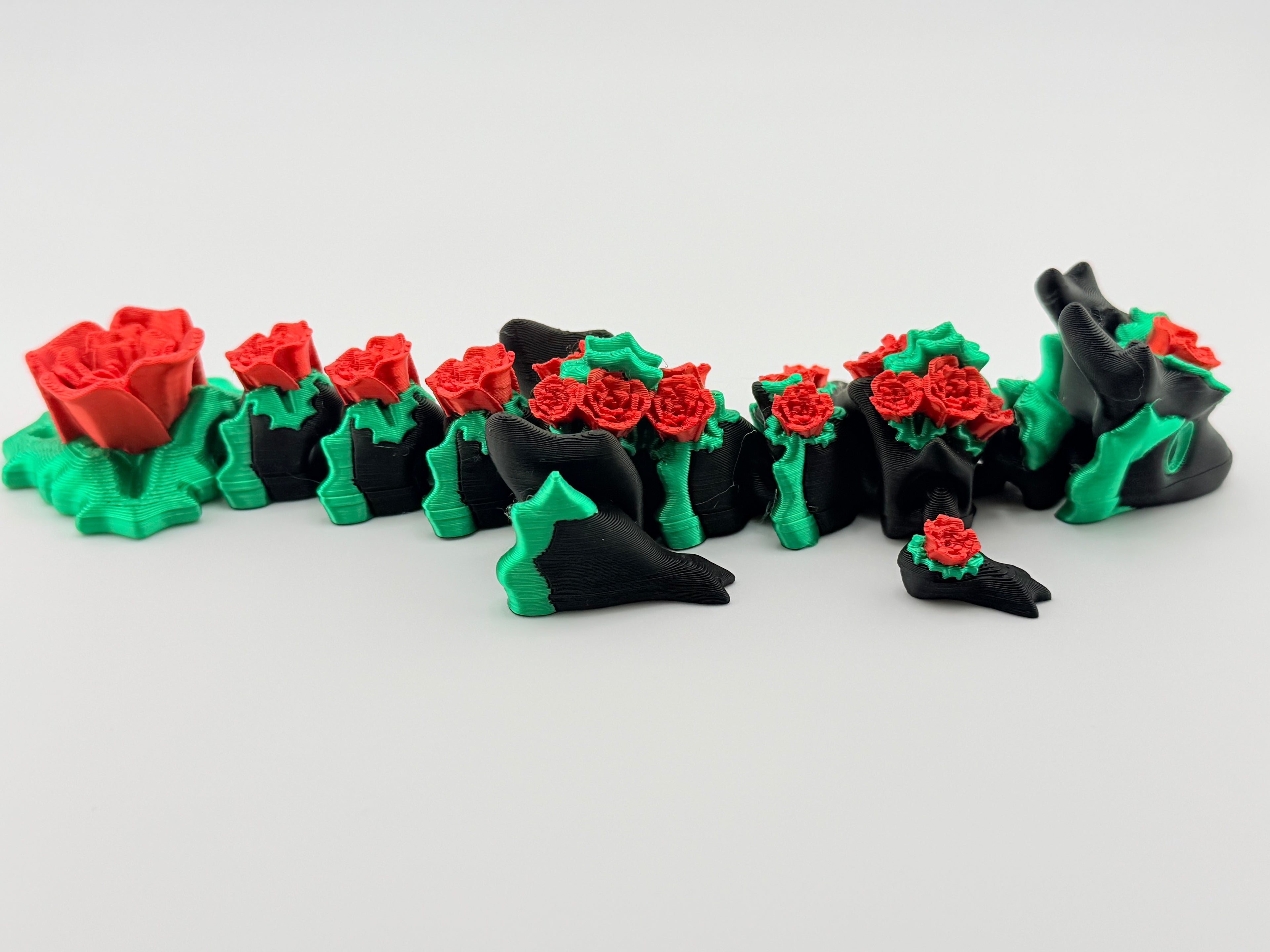 Articulated 3D printed Dragon-Black silk body with green accents and red roses